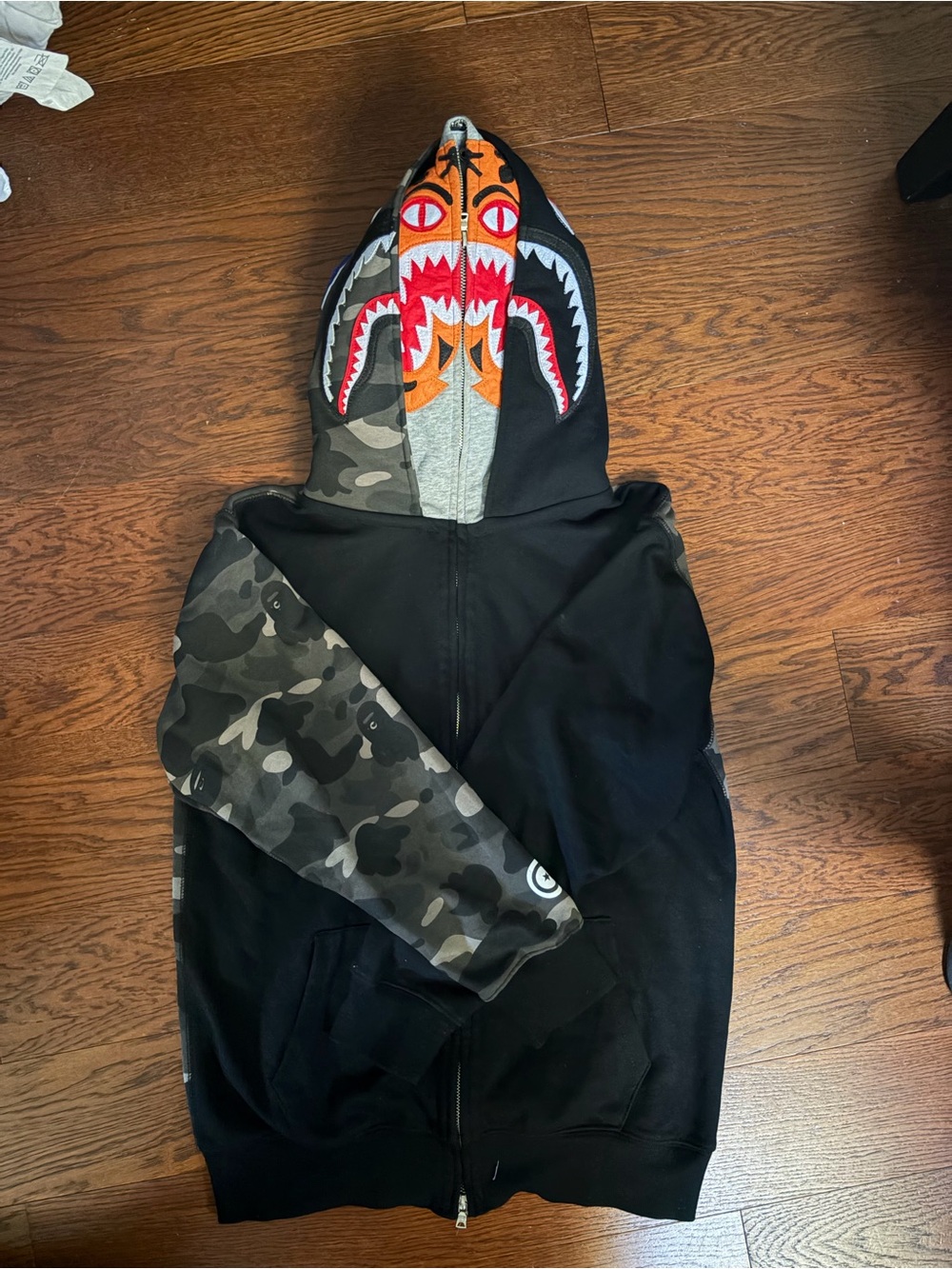 Bape Black Hoodie with Orange Shark-Graphic and Camo Sleeve
